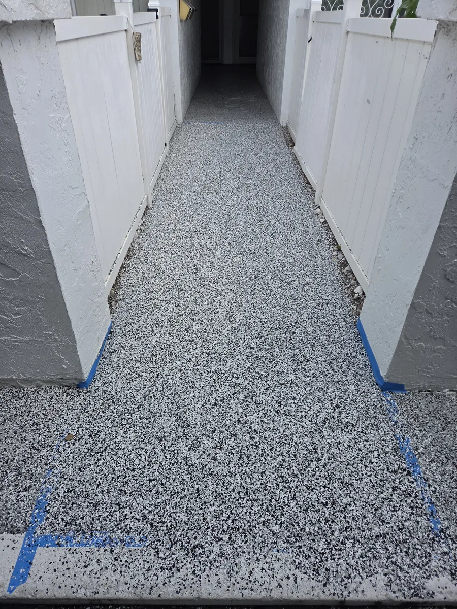 Close view of the finished flake walkway coating with a slip-resistant texture